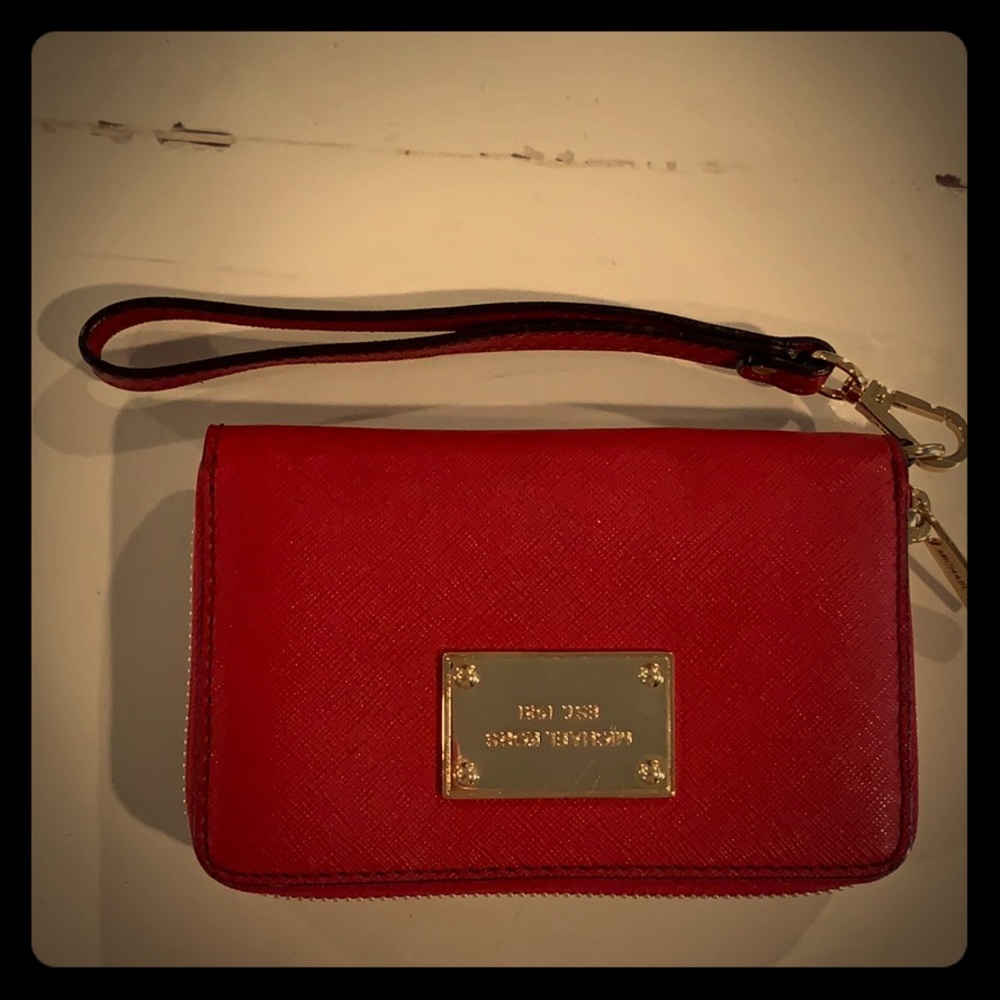Michael Kohl’s leather wristlet
